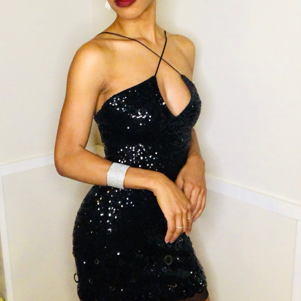 Black sequin mini dress by bebe